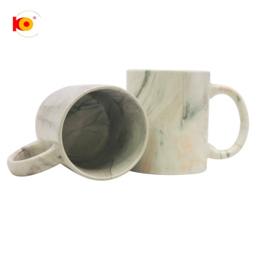 Taza de cerámica de textura de mármol personalizada de fábrica 11 oz esmaltada